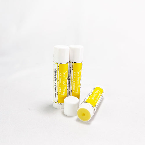 See trust honey lip balms - 3 pk citrus honey, un capped to see the balm.