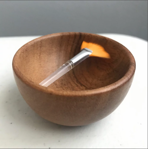 This little wooden bowl and cute mini mask brush is the absolute perfect pair to mix up a batch of your favorite Tolly’s powdered clay mask! No two bowls are exactly alike.