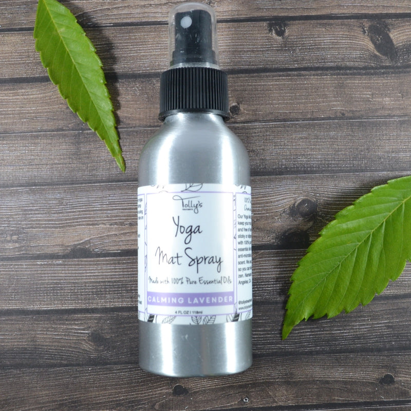 Yoga Mat Spray bottle surrounded by leaves